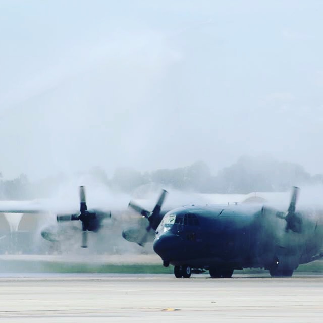 C-130 Hercules on the flight line with propeller wash